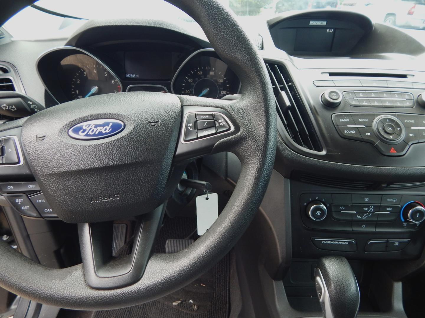 2017 Charcoal Metallic /Gray Ford Escape S (1FMCU0F71HU) with an 1.5L 4 cyl. engine, Automatic transmission, located at 3120 W Tennessee St, Tallahassee, FL, 32304-1002, (850) 575-6702, 30.458841, -84.349648 - Photo#4